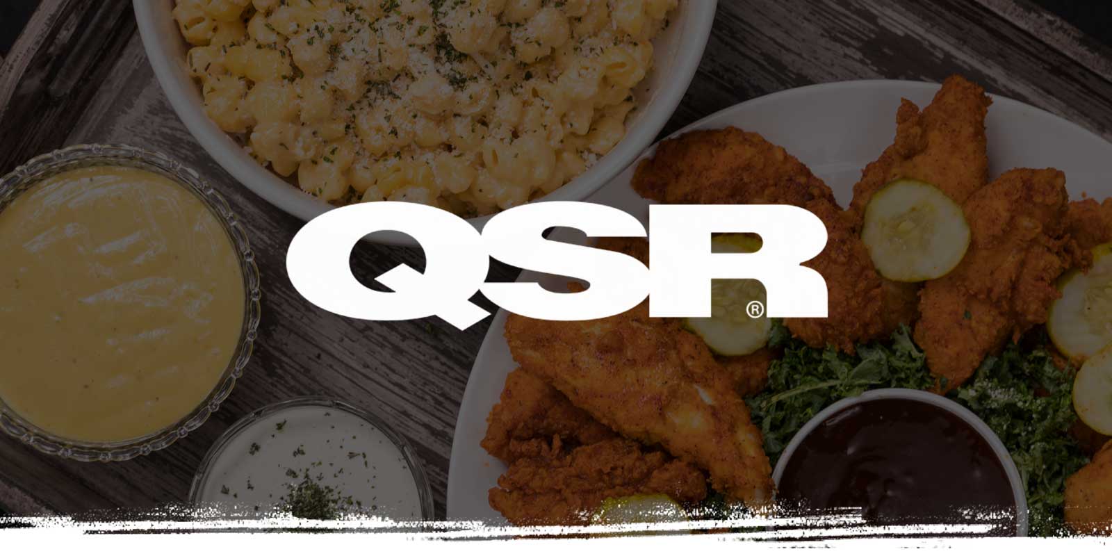 QSR logo on catering table background